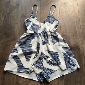 White spaghetti strap romper with blue pattern